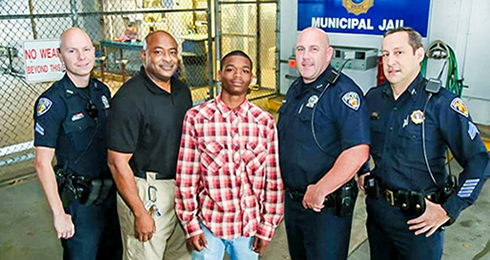 Jamal Rutledge with member of the Fort Lauderdale Police Department